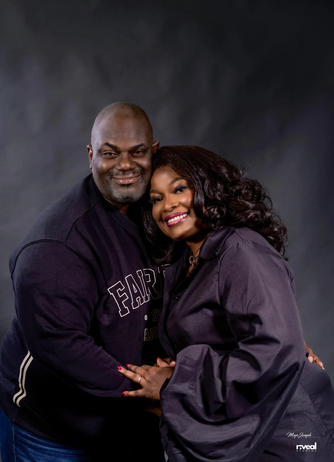 Tayo and Itee standing together in an embrace