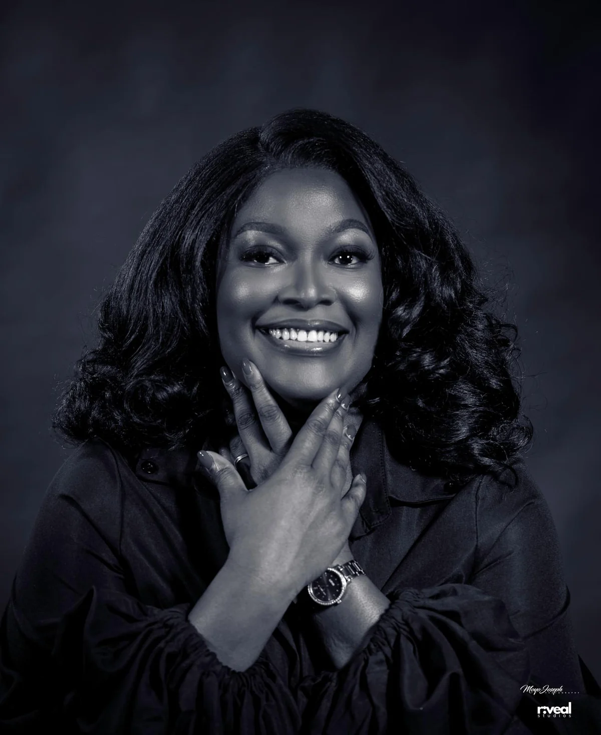 Black and white portrait of Itee smiling